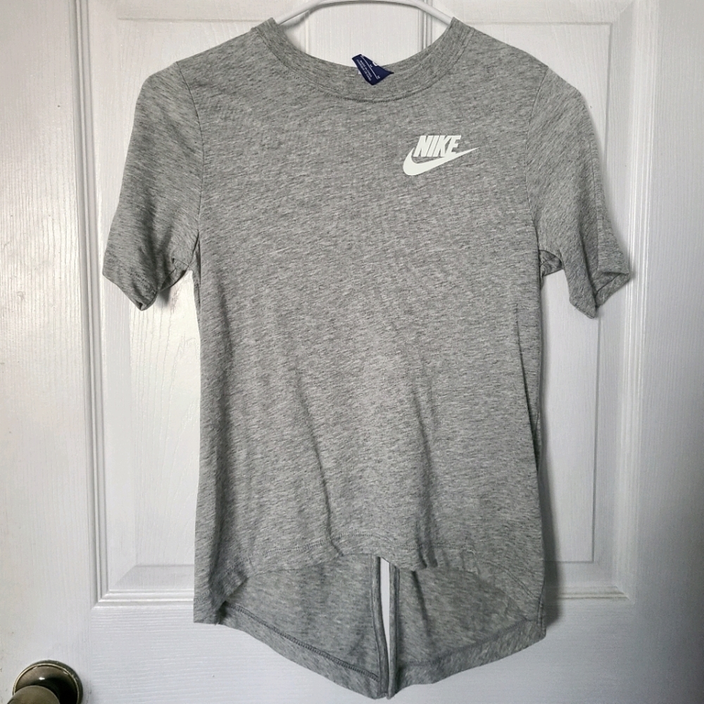Girls nike t shirt with split back, size medium